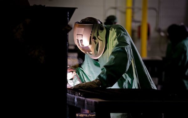 Image of Goodwill Greenworks employee welding