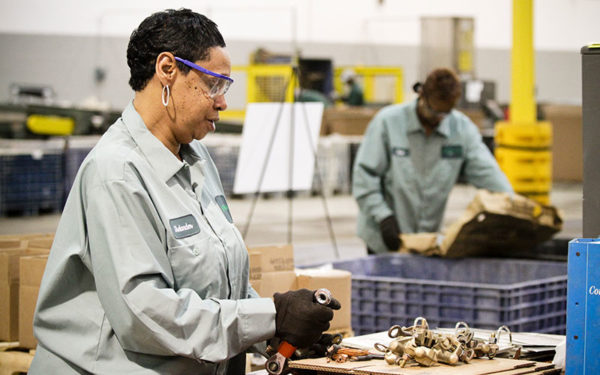 Image of woman working at Goodwill Greenworks