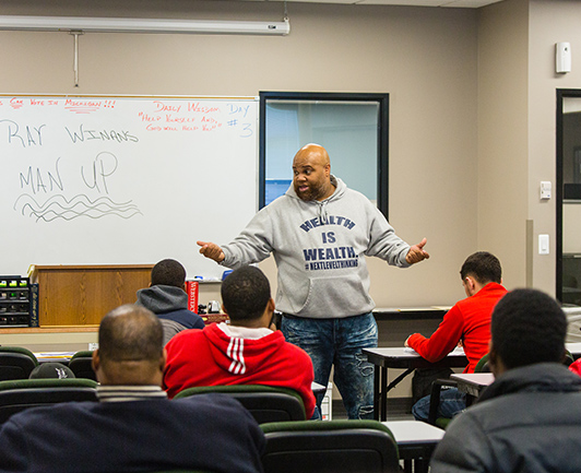 Image of Flip the Script instructor teaching group of students