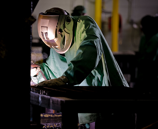 Image of Goodwill Greenworks employee welding
